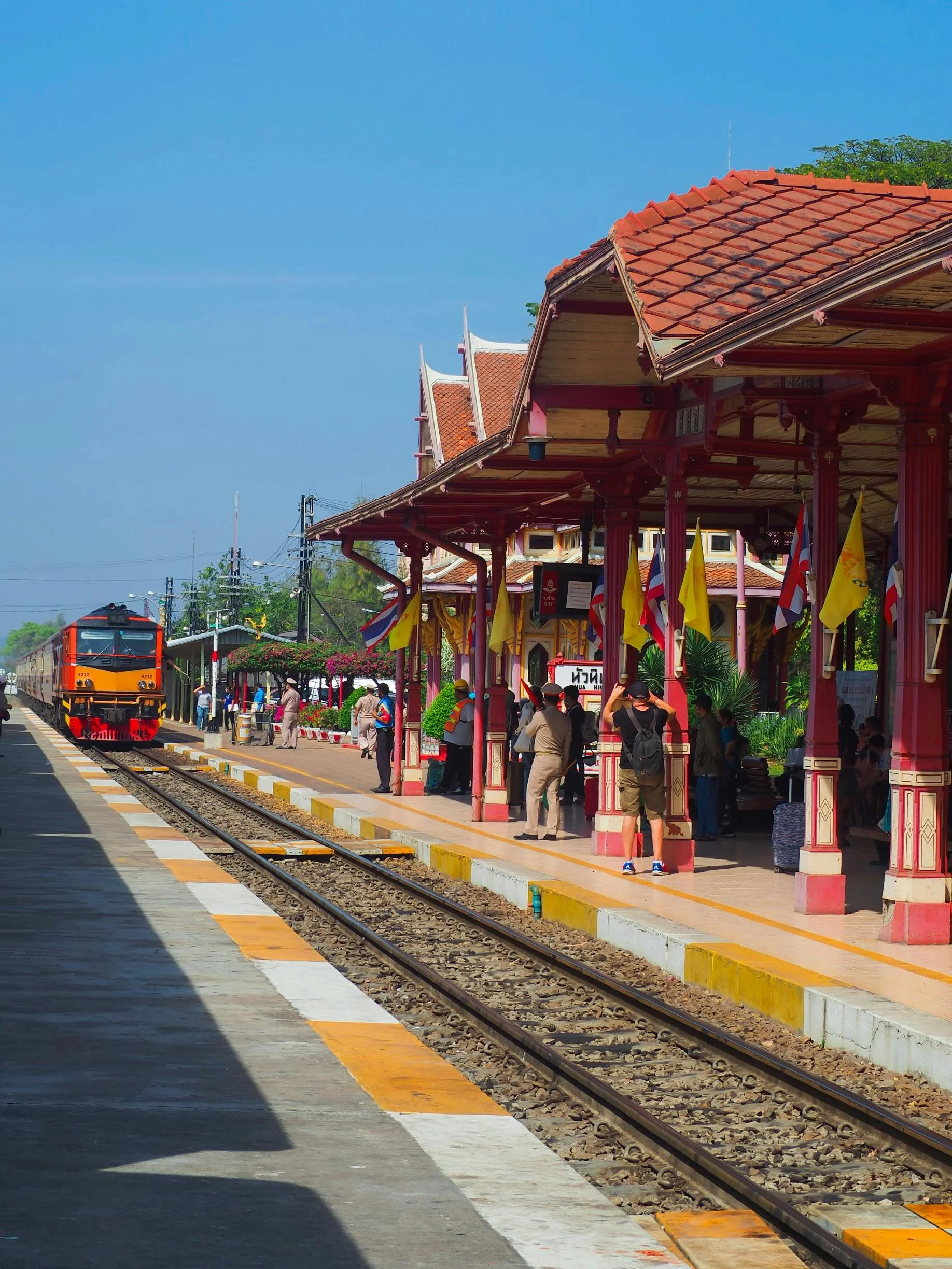 Historic Hua Hin railway station, with its traditional red architecture